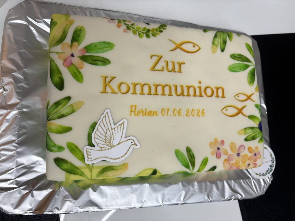 Kuchen zur Erstkommunion von Florian mit Datum und christlichen Symbolen
